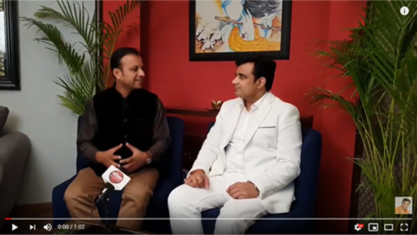 Pt. Pawan Kaushik giving interview to media